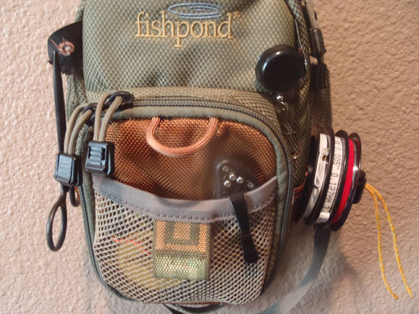 DIY tippet spool holder on a chest pack