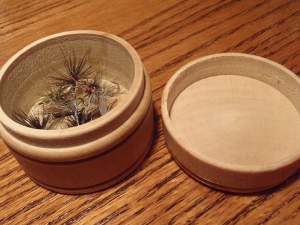 Round bamboo fly box open