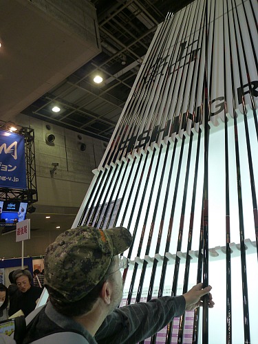 Inspecting Ayu rods at the Osaka Fishing Show