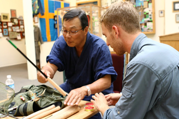 Dr. Ishigaki inspecting a Tenkara USA rod